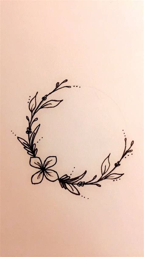 Floral wreath tattoo | Wreath tattoo, Tattoos, Body art tattoos