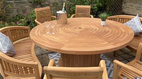 teak garden furniture round teak table chairs and benches combo - YouTube