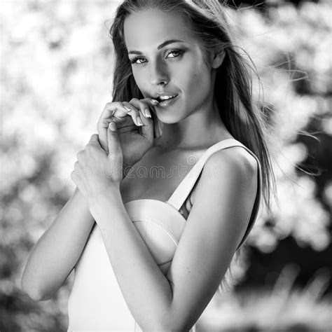 Black-white Outdoor Portrait of Beautiful Young Sexual Blonde Woman Against Nature Background ...