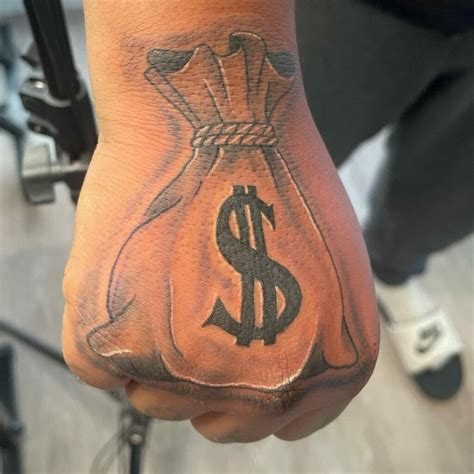 10 Best Money Bag Tattoo On Hand Ideas That Will Blow Your Mind!