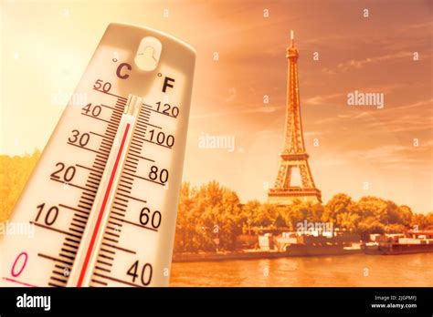Thermometer in front of Paris skyline during heatwave in France Stock Photo - Alamy