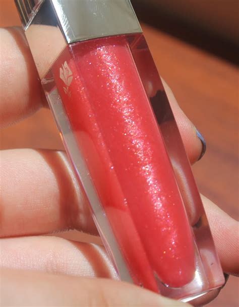 The Dark Side of Beauty: Review: Lancome Color Fever Glosses from Bronze Azure Collection