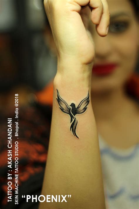 phoenix bird tattoo on hand - No Chatroom Photogallery