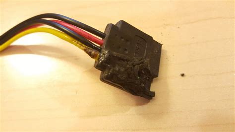 [SOLVED] Molex to SATA adapter melted... - General Hardware Forum