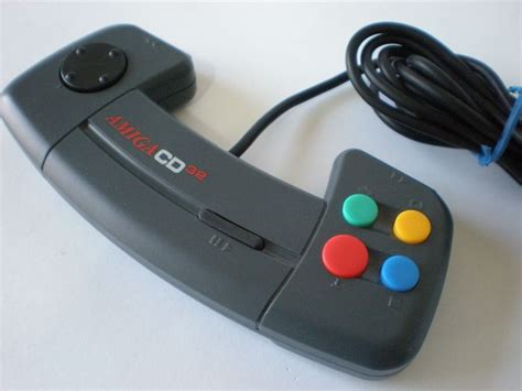 Commodore Amiga CD32 Controller :-: Released in 1993 as part of the Video Game Console of ...