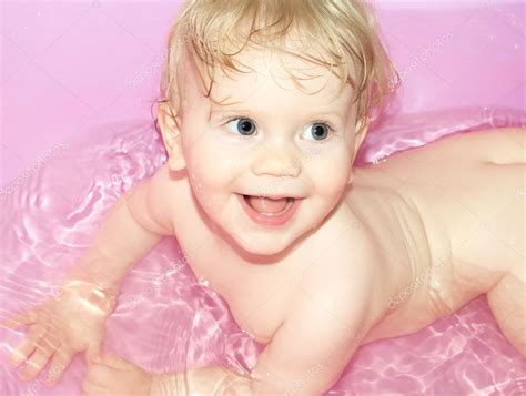 Baby girl bathing in the bath — Stock Photo © denoiser #1946926