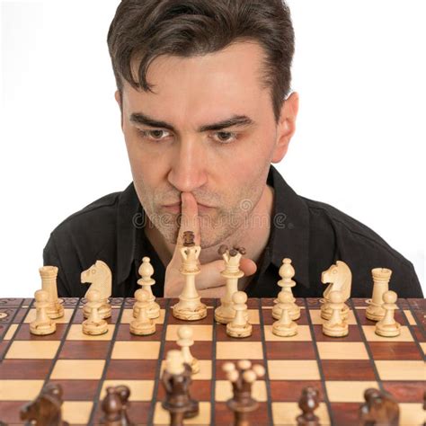 Caucasian Man Thinking about His Second Move in a Game of Chess Stock ...