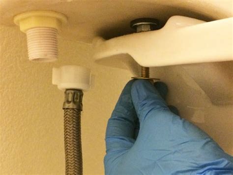 How to Fix a Toilet Leaking from the Tank Bolts or Gasket | Leaking ...