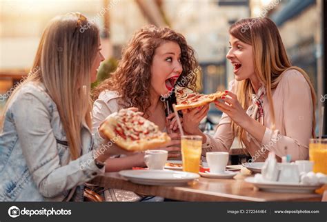 Three Cheerful Girls Eating Pizza Outdoor Restaurant People Food Drink Stock Photo by ...