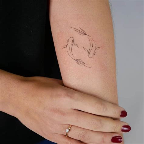 Pisces Fish Sign Tattoo: 10 Stunning Designs You'll Want to Get Inked Now!