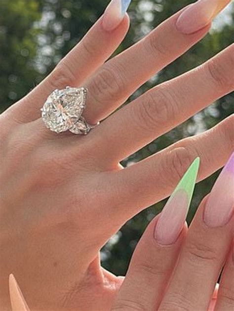 Khloe Kardashian removes engagement ring from Tristan Thompson amid ...