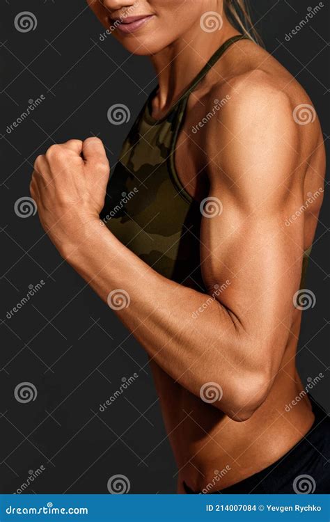 The Strong Sporty Woman Showing Her Muscles. Stock Photo - Image of ...