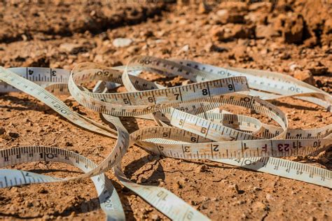 Measuring tape placed on the ground at a construction site 3702887 Stock Photo at Vecteezy