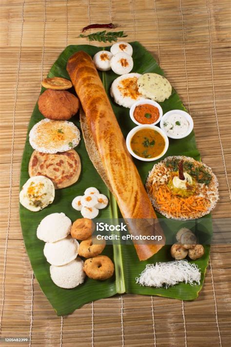 Traditional South Indian Snacks Dosa Idli Medu Wada On Banana Leaf ...