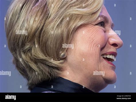 Hillary Clinton walks on stage for a book tour event in Vancouver, B.C ...