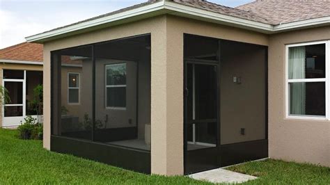 a small house sitting on top of a lush green field next to a grass covered yard