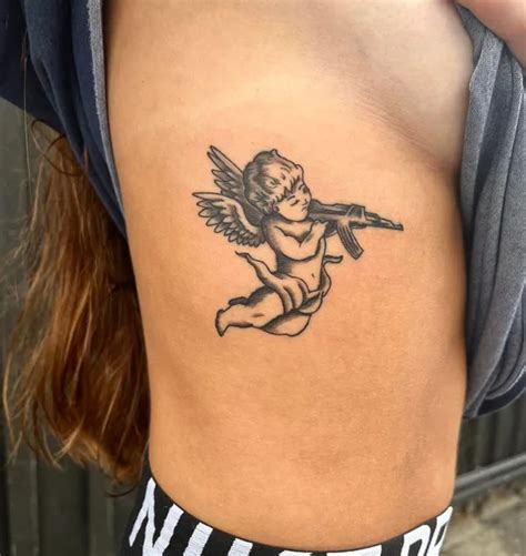 29 Stupefying Cupid Tattoo Ideas To Show Your Love