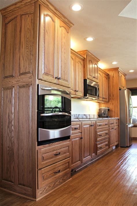 Pictures Of Oak Kitchen Cabinets - Remodelaholic | From Oak to Beautiful White Kitchen Cabinets ...