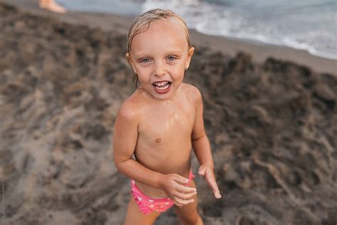 "Child On The Beach" by Stocksy Contributor "Brat Co" - Stocksy