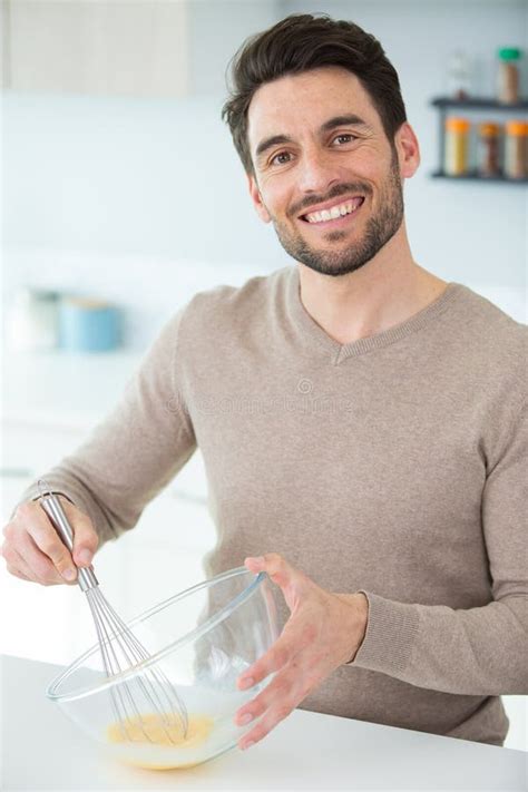 Domesticated Man Whisking Eggs at Home Stock Image - Image of cuisine, scramble: 260339579