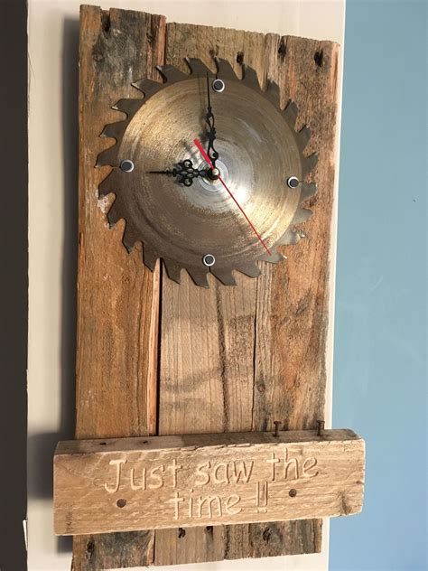 Circular saw blade as a pallet wood wall clock with the words ' Just saw the time !! '. Cnc ...