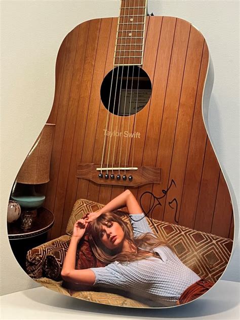 Taylor Swift Gives Signed Guitar to Charity Auction - Tales From The ...