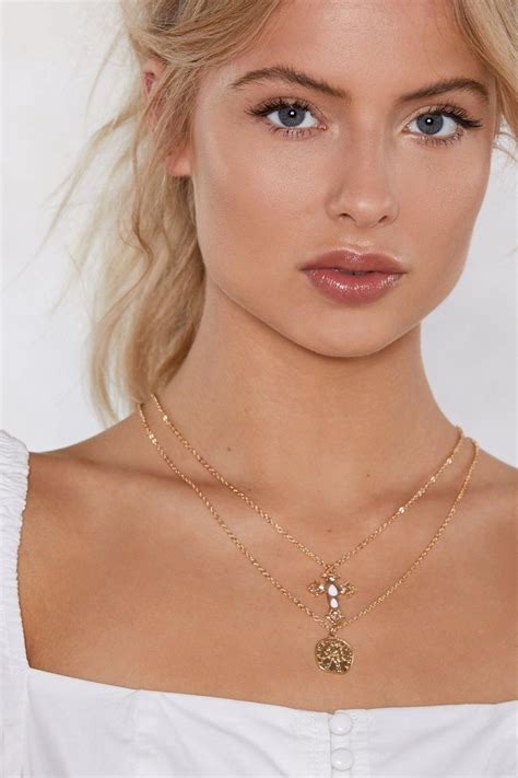 A girl's got needs. The I Wanna Get Layered Necklace features a layered design, two dainty ...