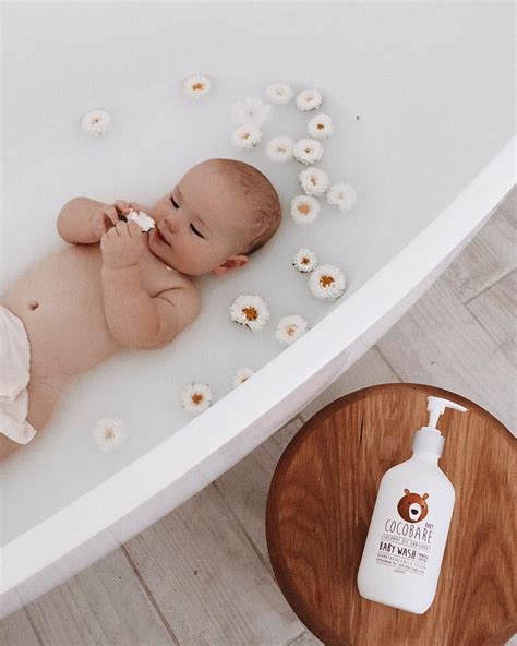 Little babe bathing in his @cocobarebaby bath wash. It gives me such ...