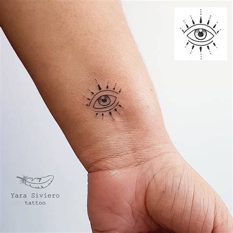Discover 71+ evil eye wrist tattoo latest - in.cdgdbentre