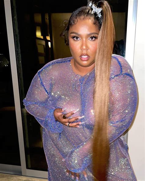 Lizzo slams haters who dissed her viral see-through dress after she twerked for fans while ...