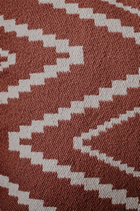 White Zigzag Pattern on Red Fabric · Free Stock Photo