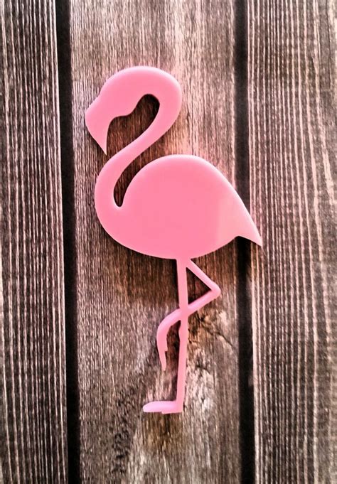 Laser cut pink flamingo brooch | Wood craft patterns, Pink flamingos, Wood art projects
