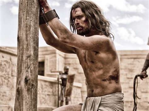 Jim Caviezel as Jesus flogged in "Song of God" (Hijodedios Hearst Entertainment Productions ...