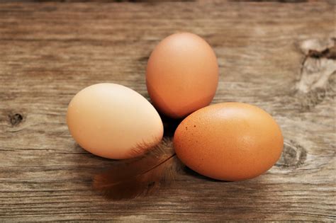 Three Brown Eggs On Wood Table Free Stock Photo - Public Domain Pictures