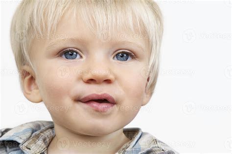 Cute Baby Boy With Blue Eyes 880617 Stock Photo at Vecteezy