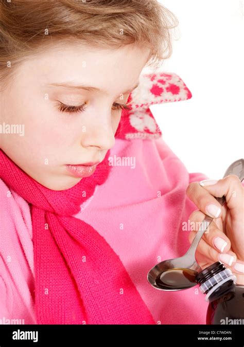 Sick child take medicine with doctor Stock Photo - Alamy