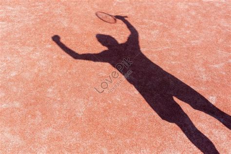 The Successful Mans Shadow On Red Tennis Court During Match Picture And HD Photos | Free ...