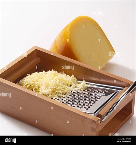 Grating cheese hi-res stock photography and images - Alamy