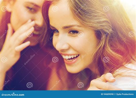 Smiling Young Women Gossiping and Whispering Stock Photo - Image of gossiper, confidential: 94689098