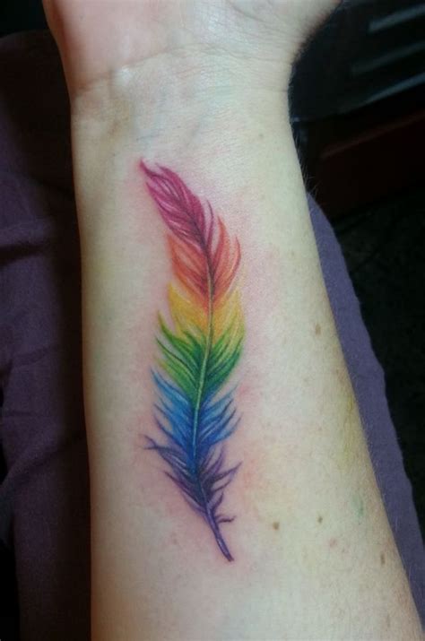 Show Your Pride with One of These Amazing Rainbow-hued Tattoos ... | Rainbow tattoos, Feather ...