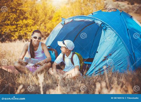 Family camping in the park stock photo. Image of leisure - 58740516
