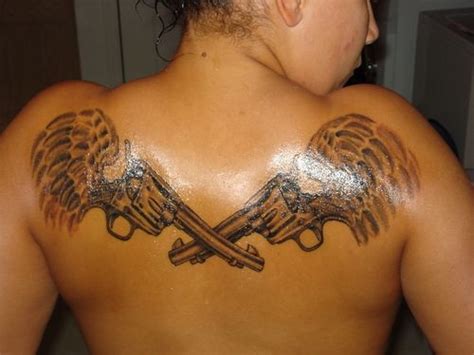 50 Most Beautiful Pistol Tattoo Design Pictures