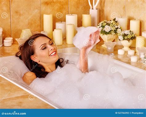 Woman Relaxing At Bubble Bath Stock Photo | CartoonDealer.com #52756392