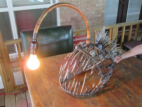 Pin on Angler Fish Lamp | Metal art techniques, Scrap metal art, Metal sculpture wall art