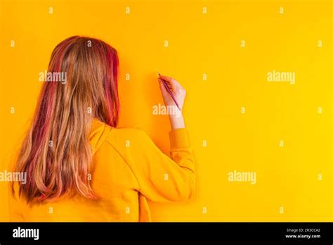 Young girl writing message for future generations Stock Photo - Alamy