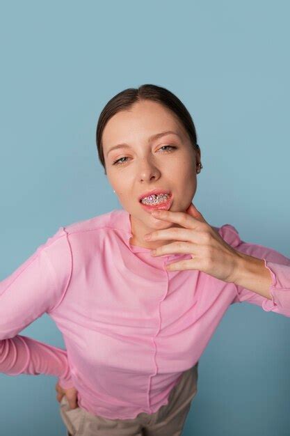 Premium Photo | High angle woman posing with dental gems