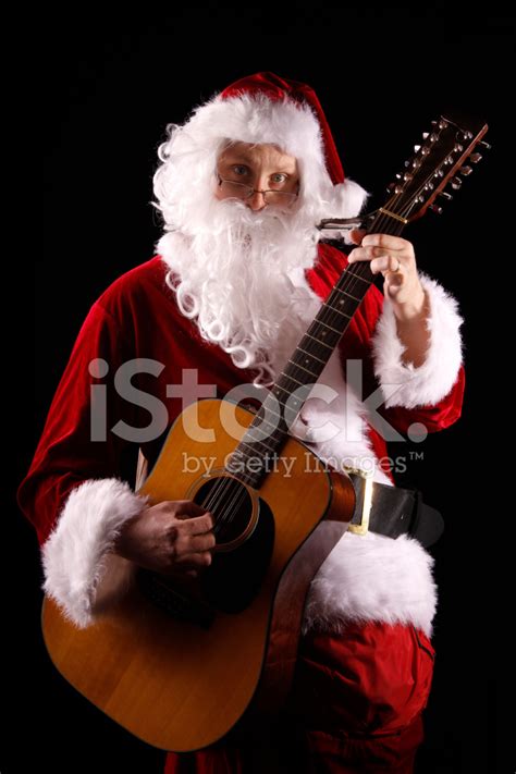 Santa Claus Playing The Guitar Stock Photo | Royalty-Free | FreeImages