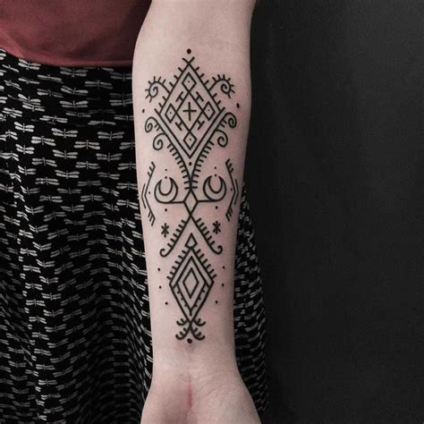 Berber ornament tattoo on the right forearm #hearttattoosonneck ...