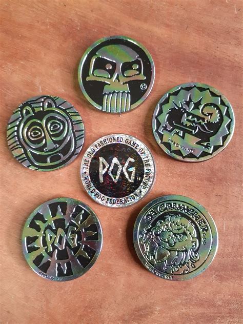 Pog slammers, Hobbies & Toys, Toys & Games on Carousell