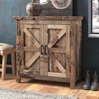 Blending rustic and industrial, this accent cabinet gives you plenty of room to organize ...